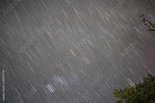 Long Exposure shot of star movement at night photo