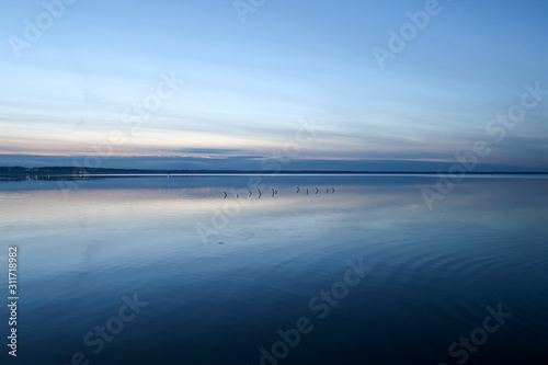 Reflection of colorful sunset in the lake