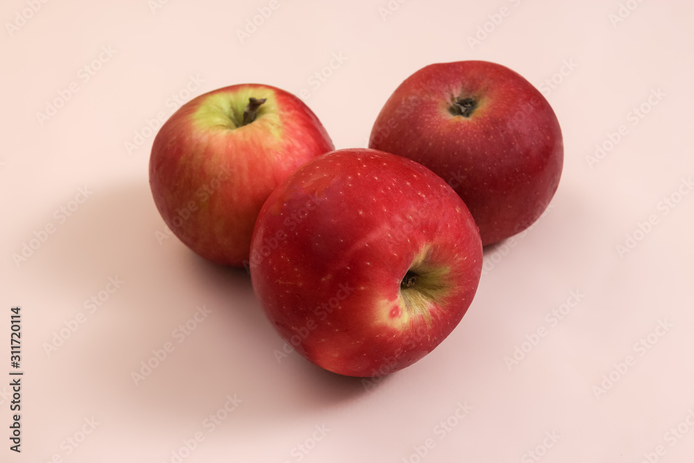 Fresh Harvested red apple lies on trend pink background. Fruit with vitamin C, Keratin. Natural Organic Top View Flat Lay. Rustic Style. Country Village Agriculture concept Fresh Harvested red apple lies on trend pink background. Fruit with vitamin C, Keratin. Natural Organic Top View Flat Lay. Rustic Style. Country Village Agriculture concept