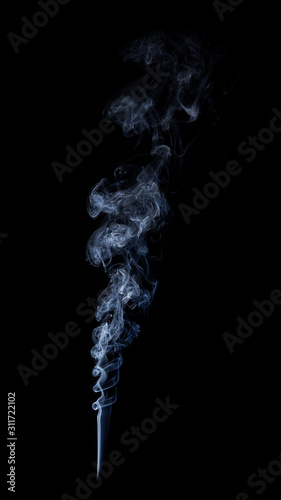 Photo of real white smoke on black background