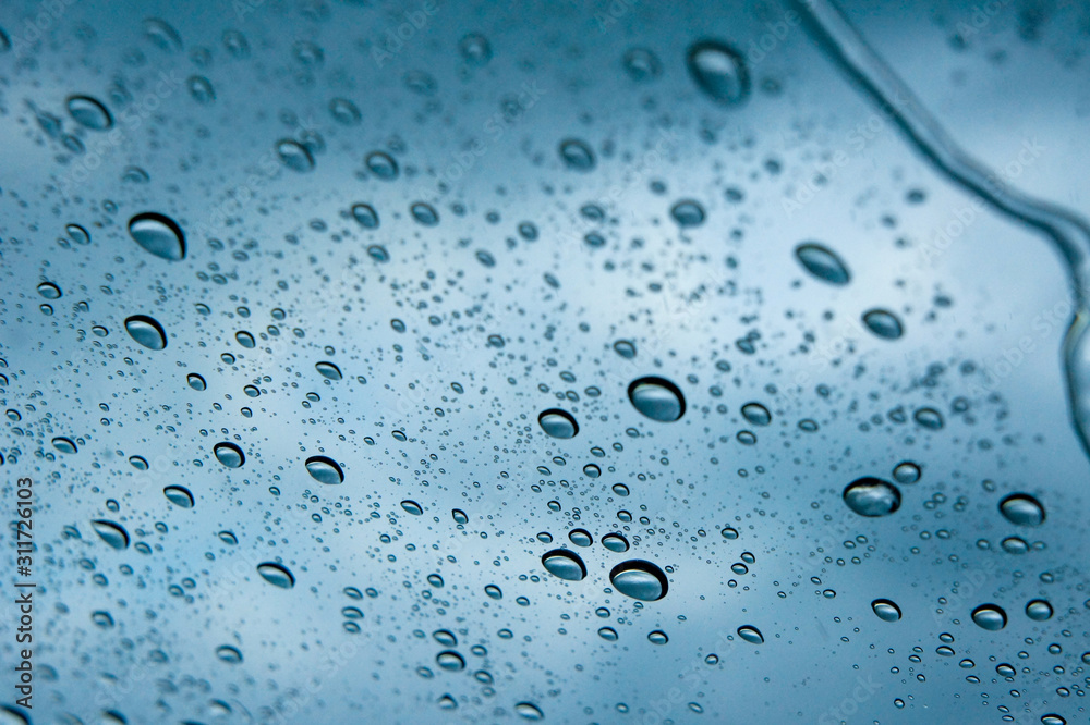 Water drop on a glass during raining season