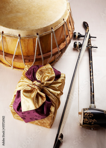 Korean traditional gifts and Haegeum. Haegeum is a Korean traditional musical instrument.