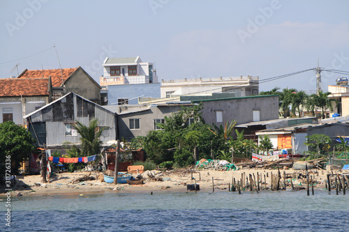 Vietnam, Nha Trang - December 11, 2019-Traditional houses, boats and river in Nha Trang.