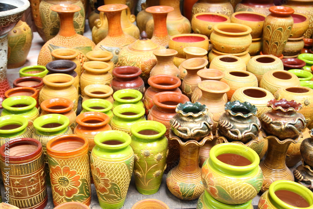 Group of colorful ceramic vases in market