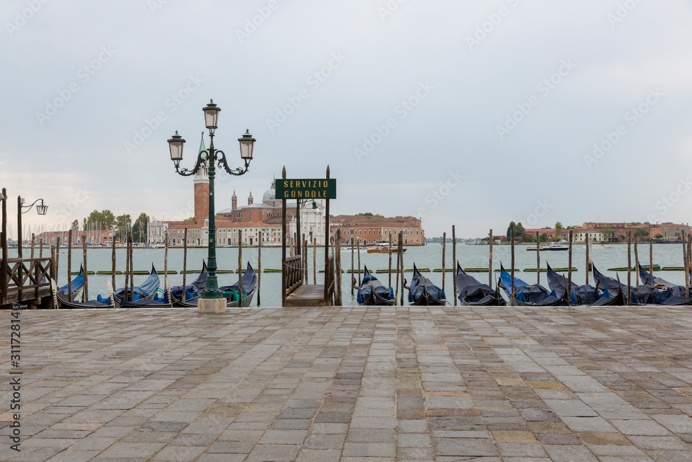  Jetty with gondolas on the Venice promenade
