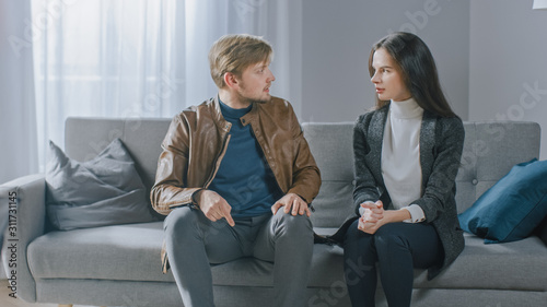 Couple on a Counseling Session with Psychotherapist. People Sitting on the Analyst Couch, Discussing Psychological Problems