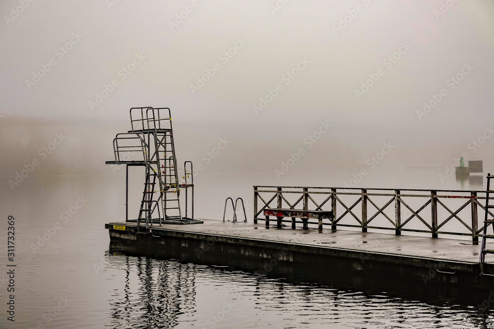 Stockholm, Sweden A diving platform in the fog at Tantolunden park.