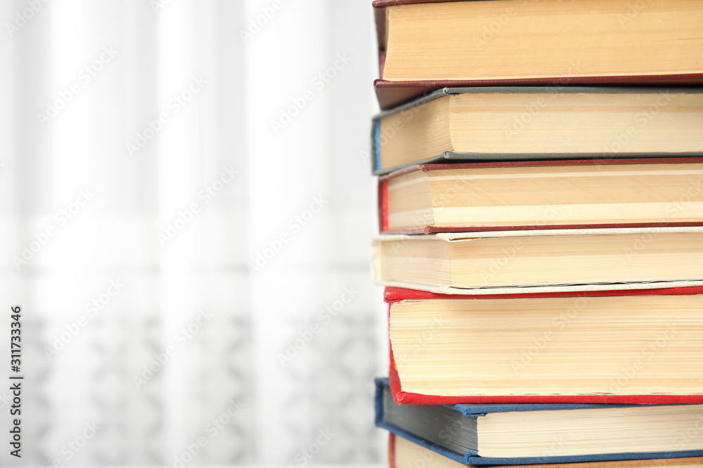 Collection of different books indoors, closeup. Space for text Collection of different books indoors, closeup. Space for text