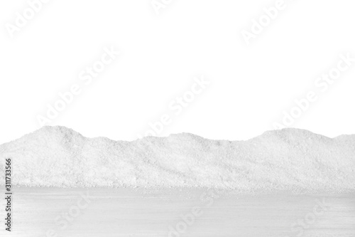 Heap of snow on wooden surface against white background © New Africa
