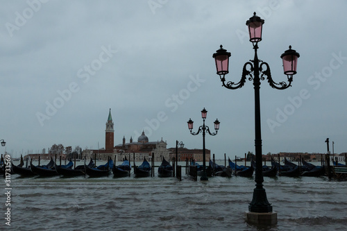 view of gondolas in Venice looking toward the island of Giudecca