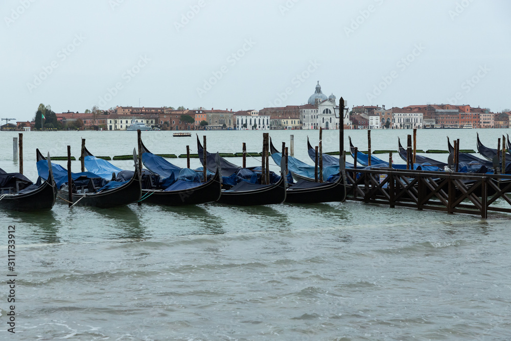 view of gondolas in Venice looking toward the island of Giudecca