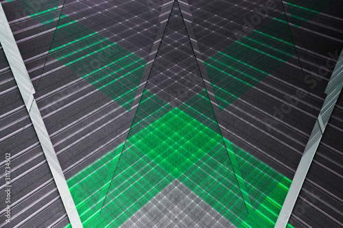 Computer graphics resembling architectural structure of panels. Abstract modern architecture background. Geometric pattern of parallel lines and angular or polygonal structure.