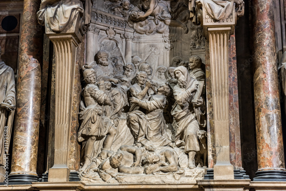 Interiors of building with sculptures of the Milan Cathedral (Duomo di Milano), the cathedral church of Milan, Lombardy, Italy. Dedicated to the Nativity of St Mary.