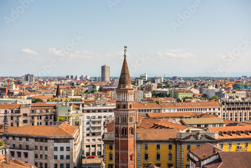  Aerial view of the old downtown of the Milan City with beautiful rooftops, view from the top of cathedral church of Milan, Lombardy, Italy.