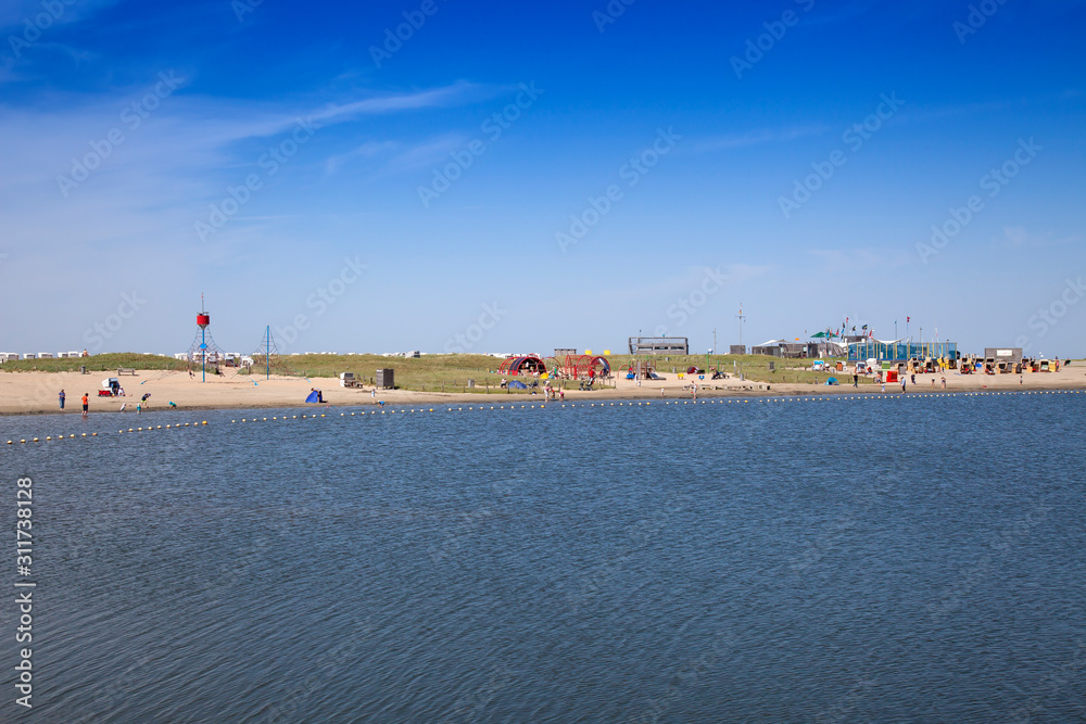View of the beach area of the family lagoon Perlebucht, Büsum, North Sea, Germany View of the beach area of the family lagoon Perlebucht, Büsum, North Sea, Germany