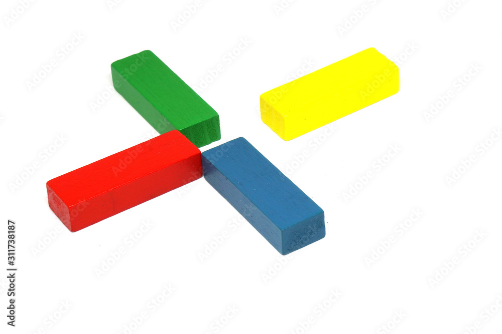 Wooden Kids Toys or jigsaw wooden for Develop children's skills arrange isolated on white background - red yellow green blue color Wooden Kids Toys or jigsaw wooden for Develop children's skills arrange isolated on white background - red yellow green blue color