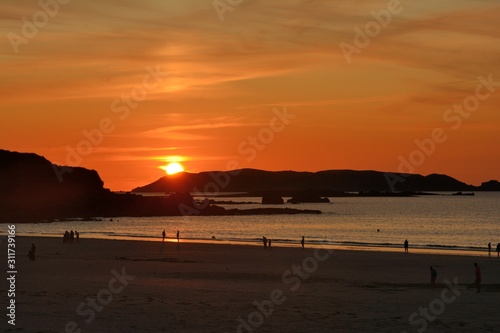 sunset on the beach in brittany France © aquaphoto