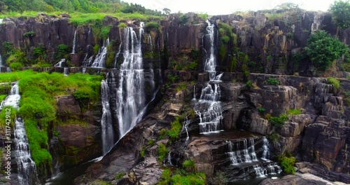 Aerial shooting of beautiful Pongour waterfall in Vietnam, Da lat city.Drone view for amazing vietnamese landscape. photo