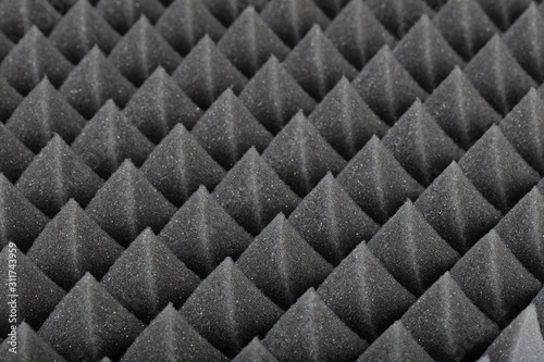 Close up of Sound Absorbing Sponge in Recording Studio. Dampening Acoustical Foam in Music Studio. Acoustic Foam Detail. photo