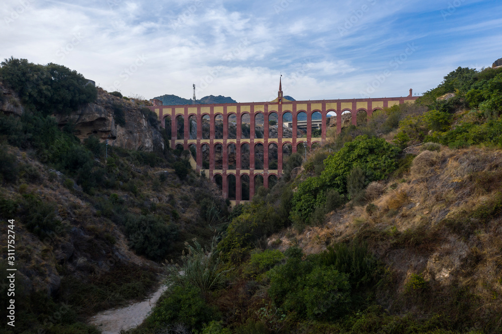 aerial view of red brick aqueduct Spain