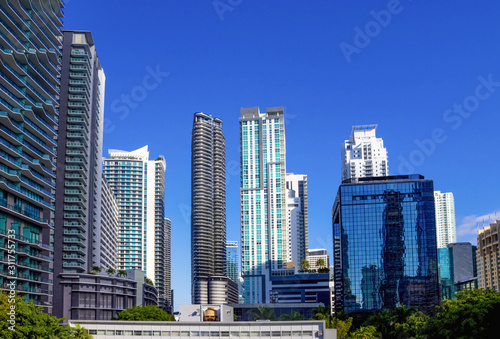 Downtown Miami cityscape view with condos and office buildings.