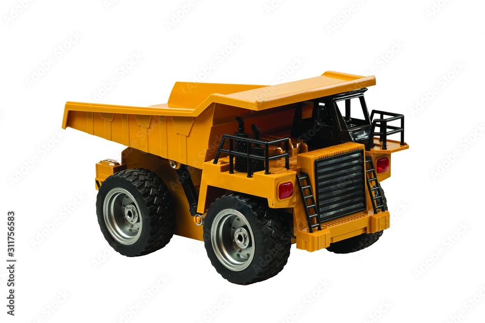 View of radio controlled model dump truck isolated on a white background. Free time. Children and adults concept.