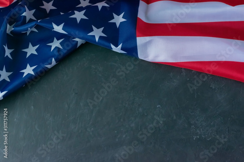 American flag on a black background. Memorial Day, Veterans Day, Labor Day. Place for text