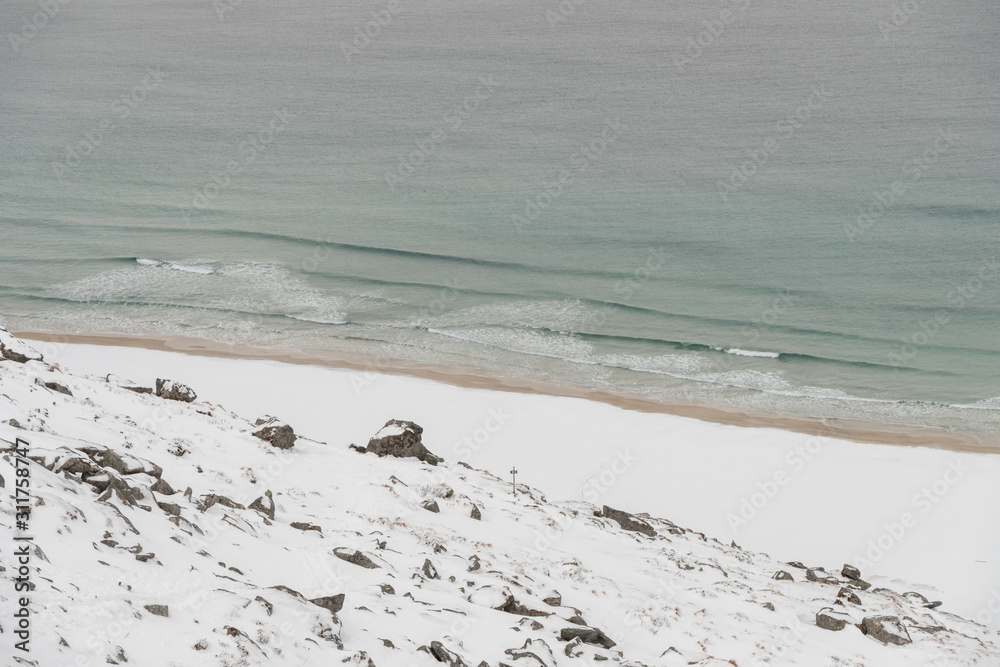 Winter beach covered with snow