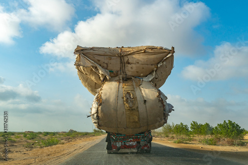 Obraz na płótnie Heavily Overloaded Trucks 03 w salonie
