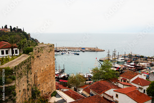 View of the tourist port. On the shore are hotels and yachts. Antalya, Turkey, April 6, 2019.