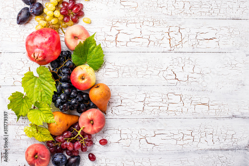 Fototapeta Naklejka Na Ścianę i Meble -  Various autumn fruits. Harvest concept