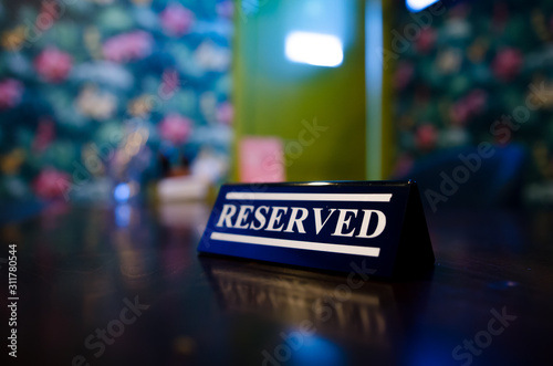 Table reservation sign close up. Ready for a party