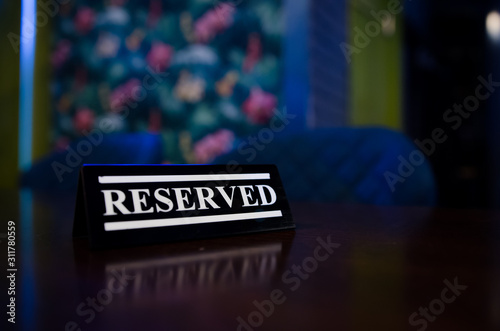 Table reservation sign close up. Ready for a party