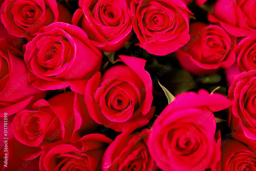 Closeup of bouquet of red roses. Best flowers in Valentine's day. Valentine's day background. Flowers for love. Best present for woman are flowers Closeup of bouquet of red roses. Best flowers in Valentine's day. Valentine's day background. Flowers for love. Best present for woman are flowers