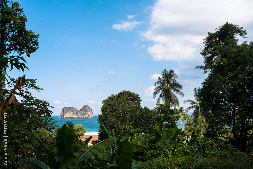 Panoramic view of a blue scenery of an exotic beach in Thailand Andaman sea. Adventure in the jungle and travel concept .Scenic landscape in paradisiacal islands. Holiday vacation background concept.
