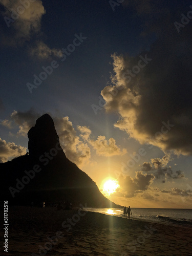View of Peak Hill and Concei    o Beach at sunset  in Fernando de Noronha  Brazil