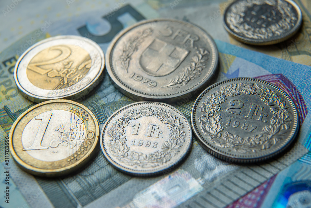 Monete e banconote di Euro e Franchi Svizzeri Monete e banconote di Euro e Franchi Svizzeri