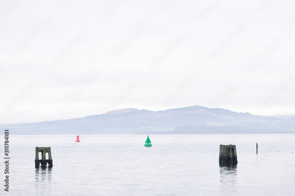 Wooden sea posts for sea ship safety at port dock