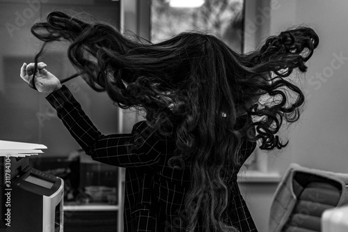 Girl dissolve her long hair