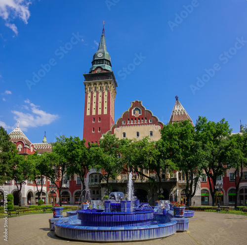 Subotica, Serbia / 3rd July 2019: View on  fountain, Korzo and City Hall built in Art-Nouveau style photo