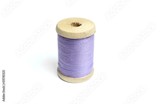 Reel, spool sewing thread isolated on white