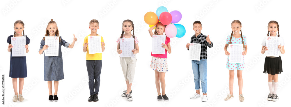 Happy children with results of school test on white background