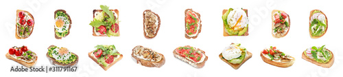 фотография Different tasty sandwiches on white background