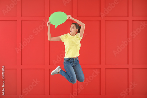 Jumping young woman with sp...