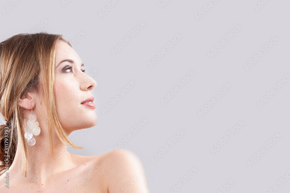 portrait of young pretty woman on lihgt background portrait of young pretty woman on lihgt background