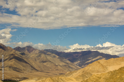 desert mountains without vegetation under the daytime sky