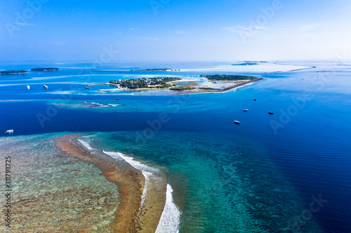 Aerial view, Maldives island Kandooma and Guraidhoo lagoon, South Male Atoll, Maldives