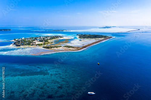 Aerial view, Maldives island Kandooma and Guraidhoo lagoon, South Male Atoll, Maldives