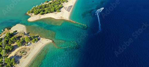 Aerial drone photo of beautiful bay and sandy beach of Glarokavos, Kassandra peninsula, Halkidiki, Greece