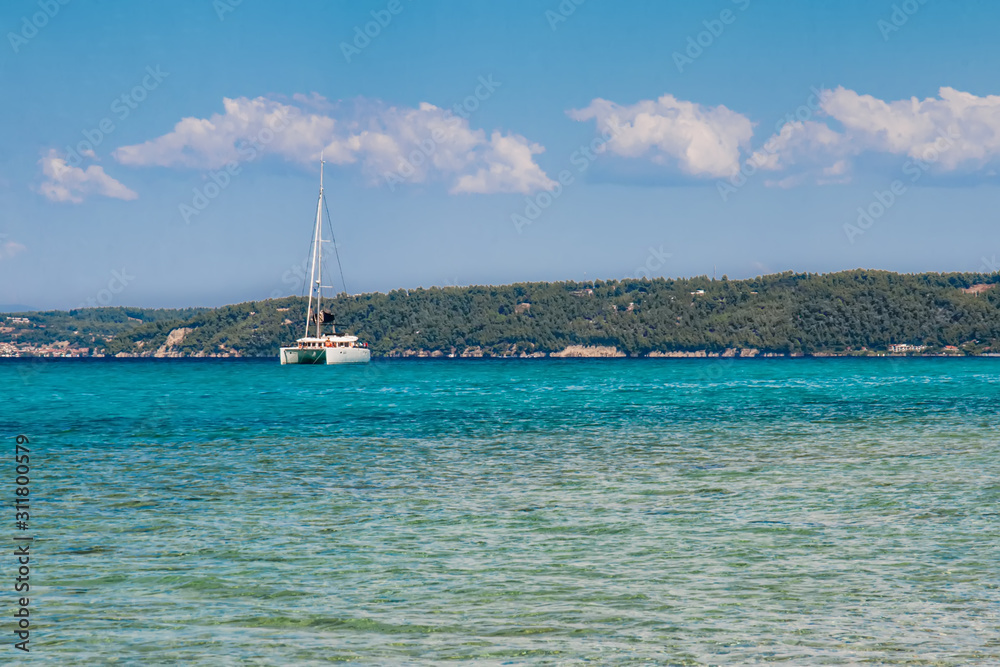 Halkidiki, Greece - September 01,2019: Possidi Beach on Halkidiki, Greece. Blue sea on Aegean sea.